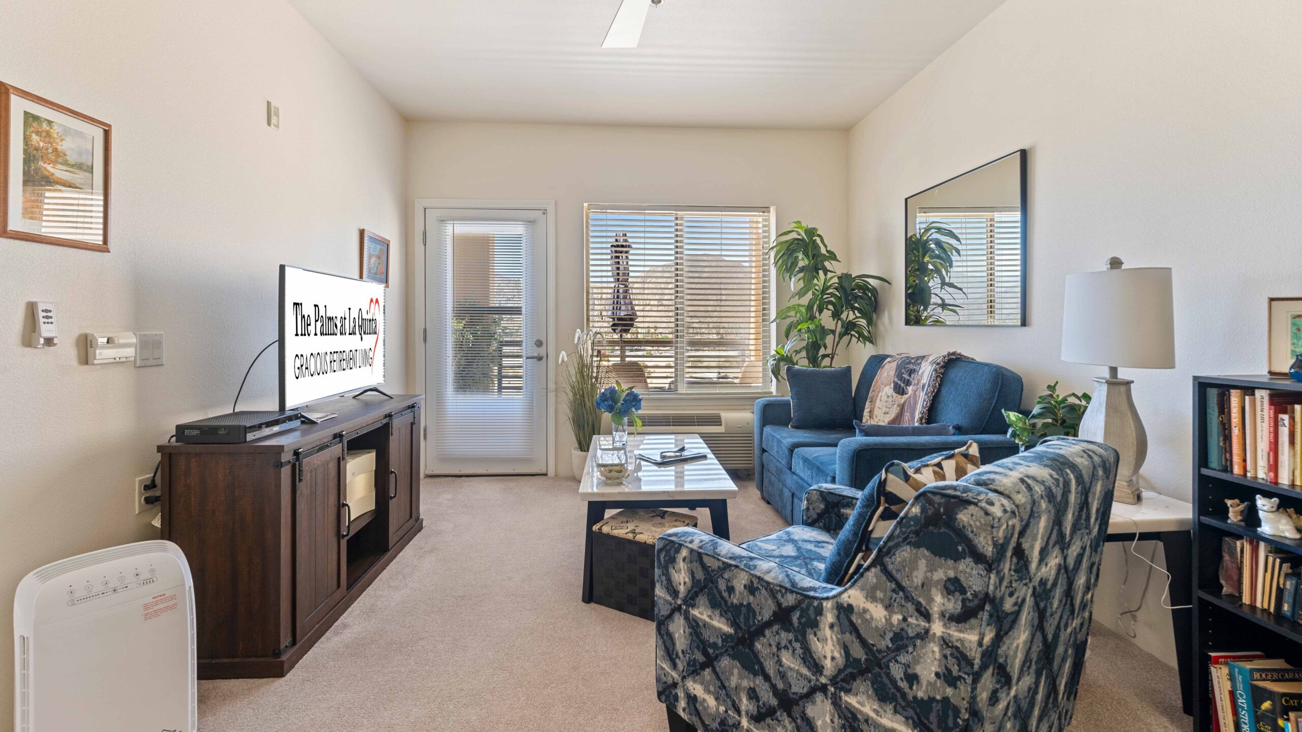 A living room in a The Palms at La Quinta apartment